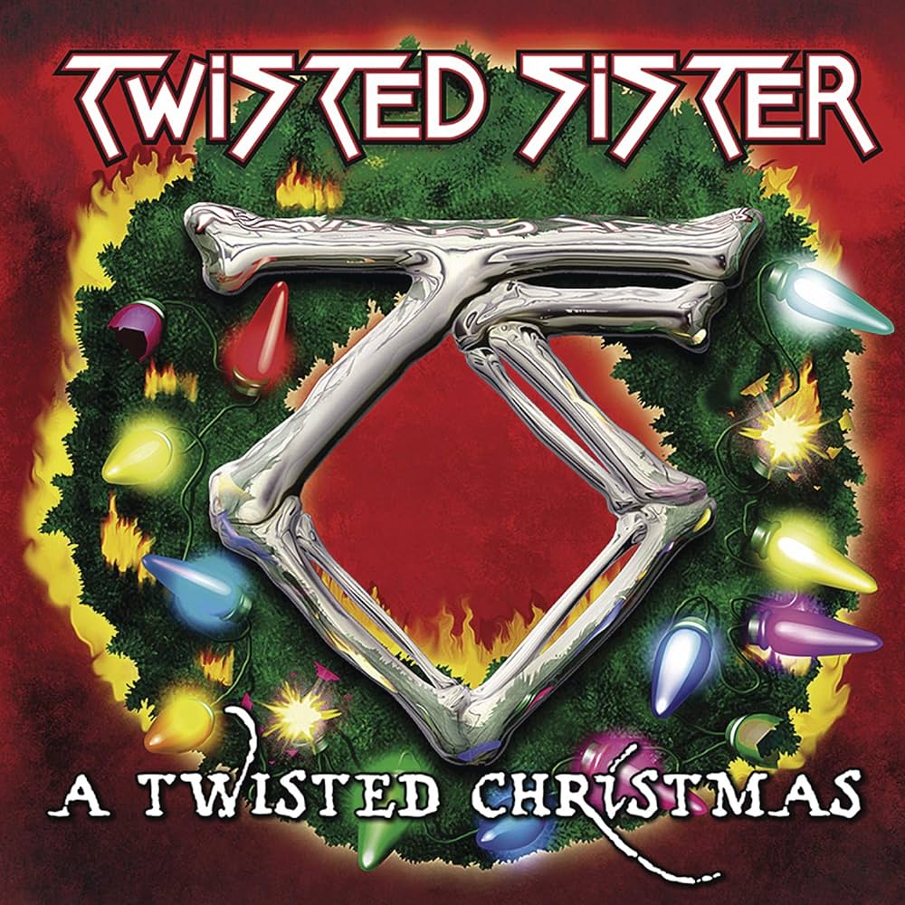 Album cover of "Twisted Sister - A Twisted Christmas" by Tandem Coffee Roasters featuring a large, metallic letter 'z' surrounded by a wreath decorated with colorful Christmas lights on a limited edition vinyl.