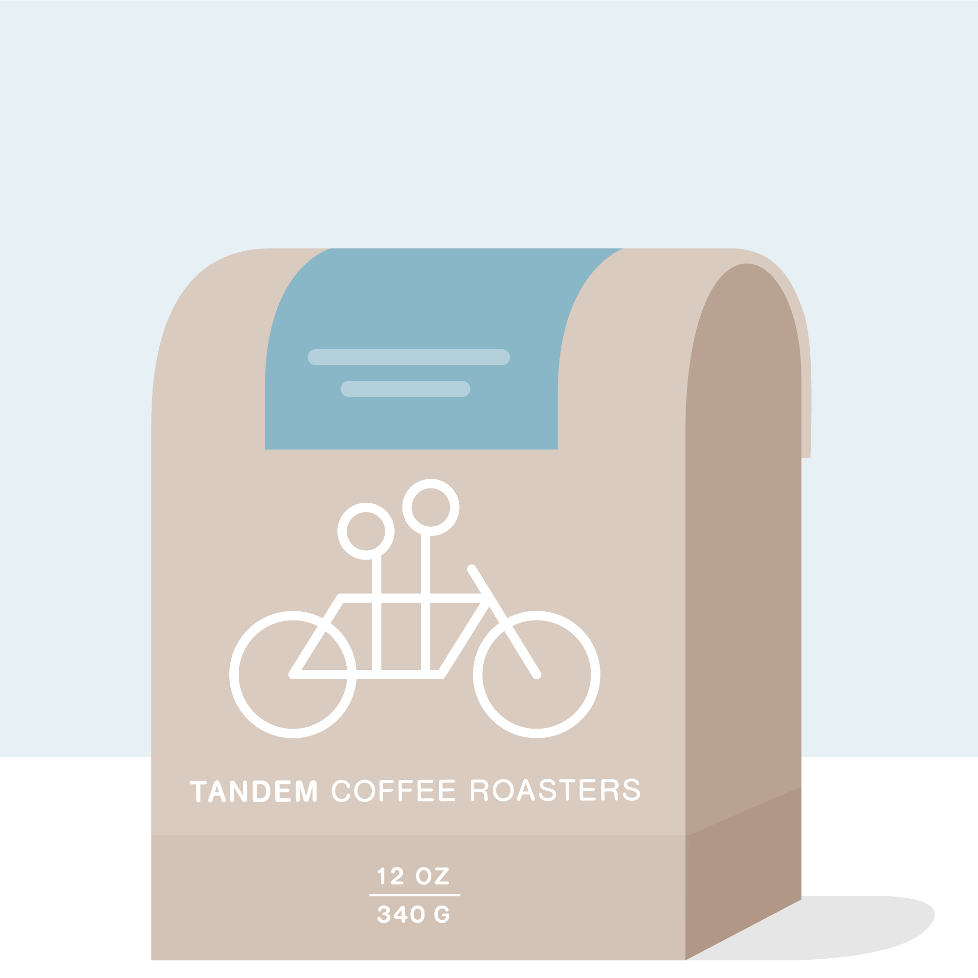 A beige coffee bag labeled Tandem Coffee Roasters displays a white tandem bicycle illustration and "Daniel Moreno - Honduras" on the front, indicating 12 oz (340 g), set against a light blue background.