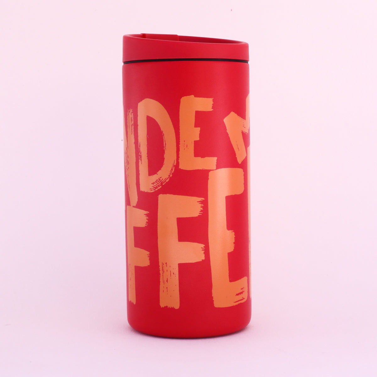 A red MiiR Painted Mug with a matching lid, featuring orange painted text that reads TANDEM COFFEE.
