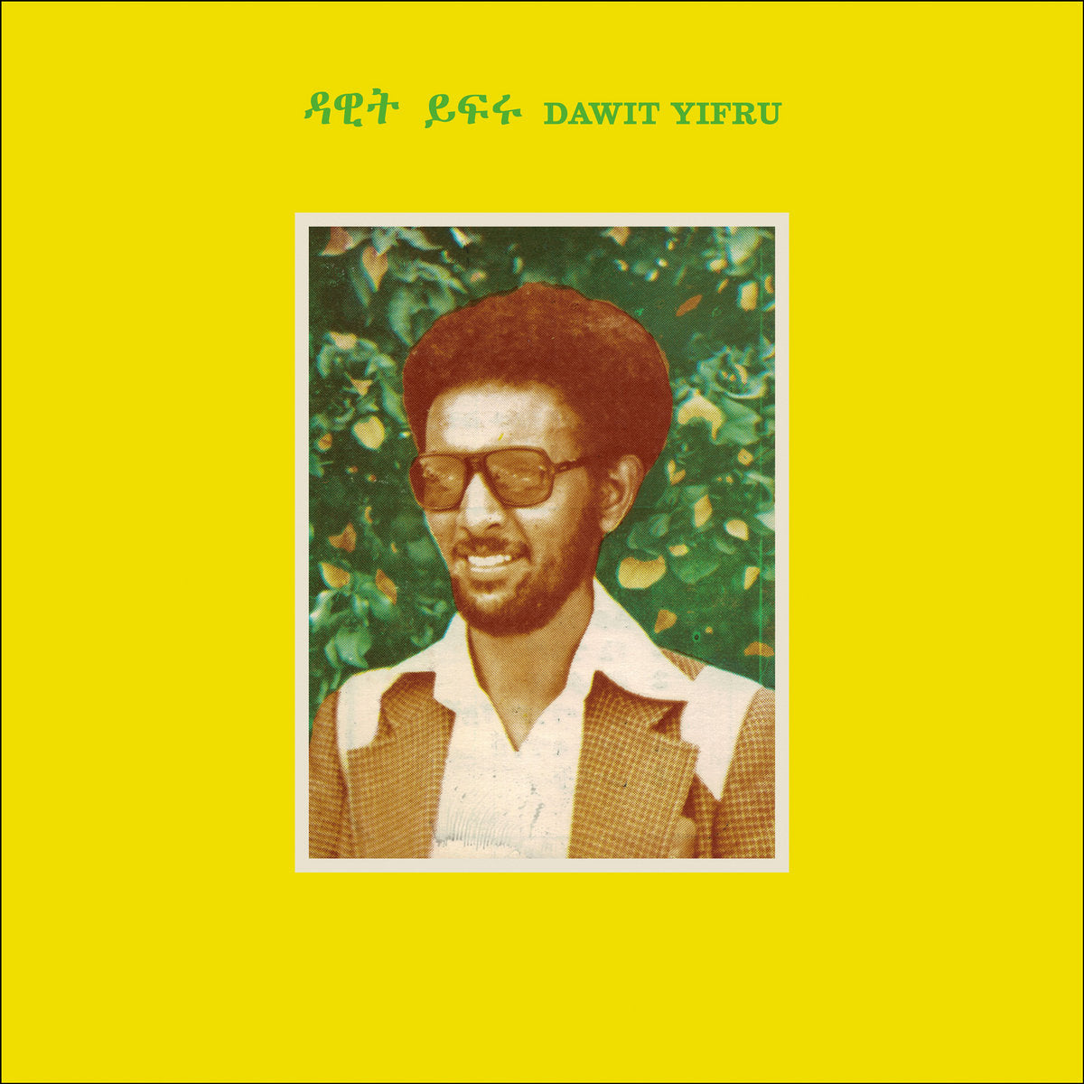 Album cover featuring a portrait of a man with an afro and sunglasses, set against a yellow background and green foliage, with Amharic text at the top promoting Dawit Yifru - Dawit Yifru.