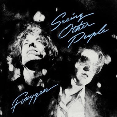 Black and white album cover for Foxygen - Seeing Other People (pink vinyl) from Tandem Coffee Roasters features two standout figures—one with messy hair, one in sunglasses—set against abstract light spots and blue handwritten text.