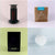 Four images in a grid: top left, a Tandem Coffee Roasters AeroPress Starter Kit; top right, a bag of freshly roasted coffee beans; bottom left, a black Huawei router; bottom right, two