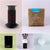 Collage of six items: an AeroPress Starter Kit, a bag of freshly roasted Tandem Coffee Roasters coffee, a black electronic device, a Zassenhaus coffee grinder, and two white bottle