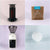 A collage of four images: top left shows a Tandem Coffee Roasters AeroPress Starter Kit, top right features a bag of la piramide freshly roasted coffee beans, bottom left is a Baratza coffee grinder, and bottom