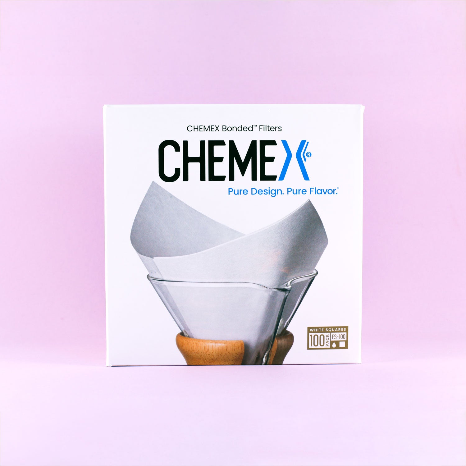 A box of Tandem Coffee Roasters Chemex Bonded Filters containing 100 filters is shown against a pink background, featuring an illustration of paper filters in a Chemex coffee maker and the words "Pure Design. Pure Flavor." on the packaging.