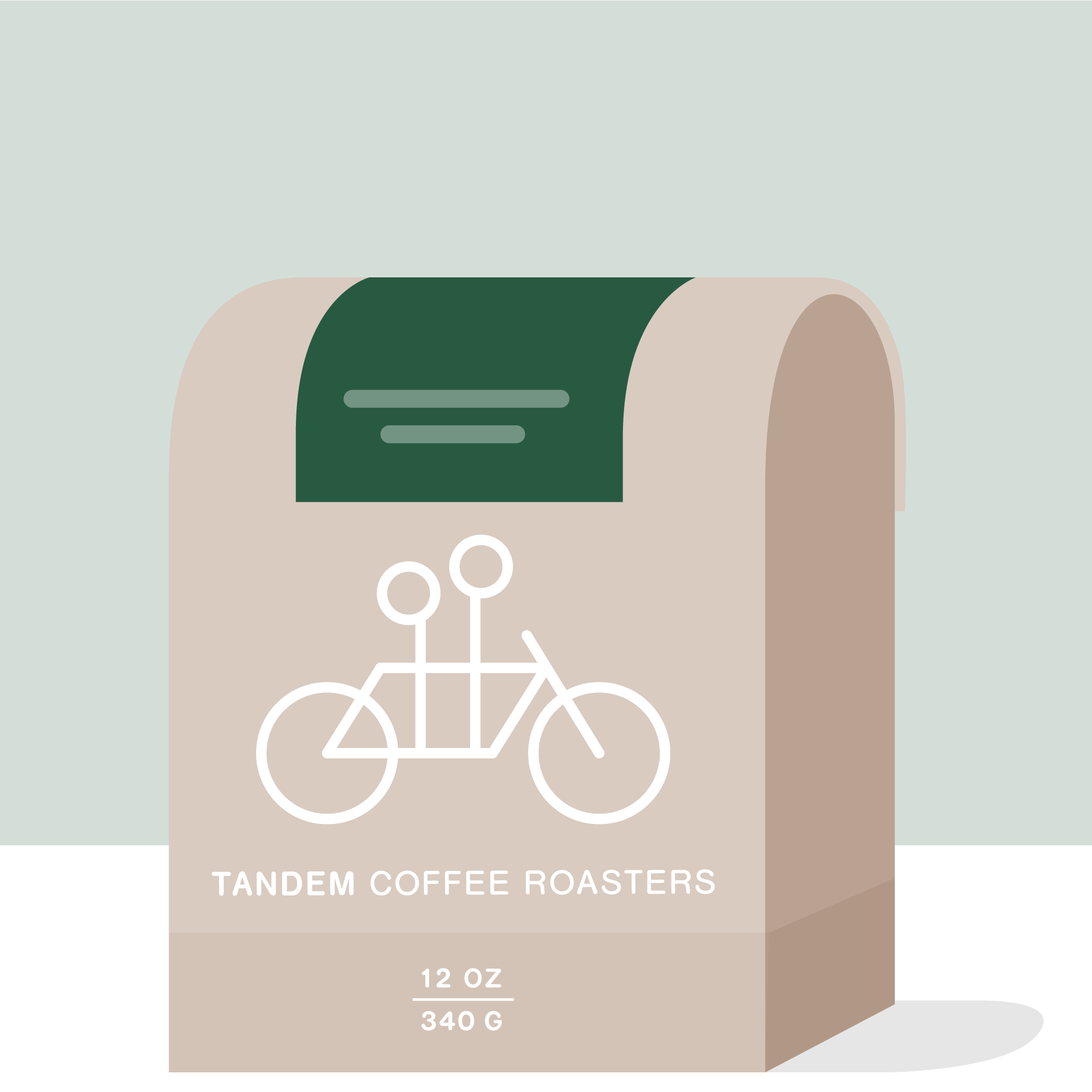 A beige Tandem Coffee Roasters bag displays a white tandem bike graphic, notes 12 oz/340 g at the bottom, sports a dark green top accent, and highlights Jhon Didier Trujillo - Colombia coffee.