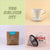 Collage of four images: top left is text "Tandem Coffee Roasters V60 Deluxe Kit", top right is a white coffee dripper, bottom left is a bag of coffee beans labeled "freshly roasted