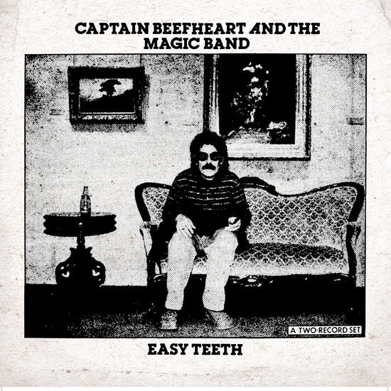 Album cover of Tandem Coffee Roasters "Captain Beefheart and The Magic Band - Easy Teeth", featuring a black and white image of a man sitting on a decorative sofa with sunglasses, next to a small table displaying