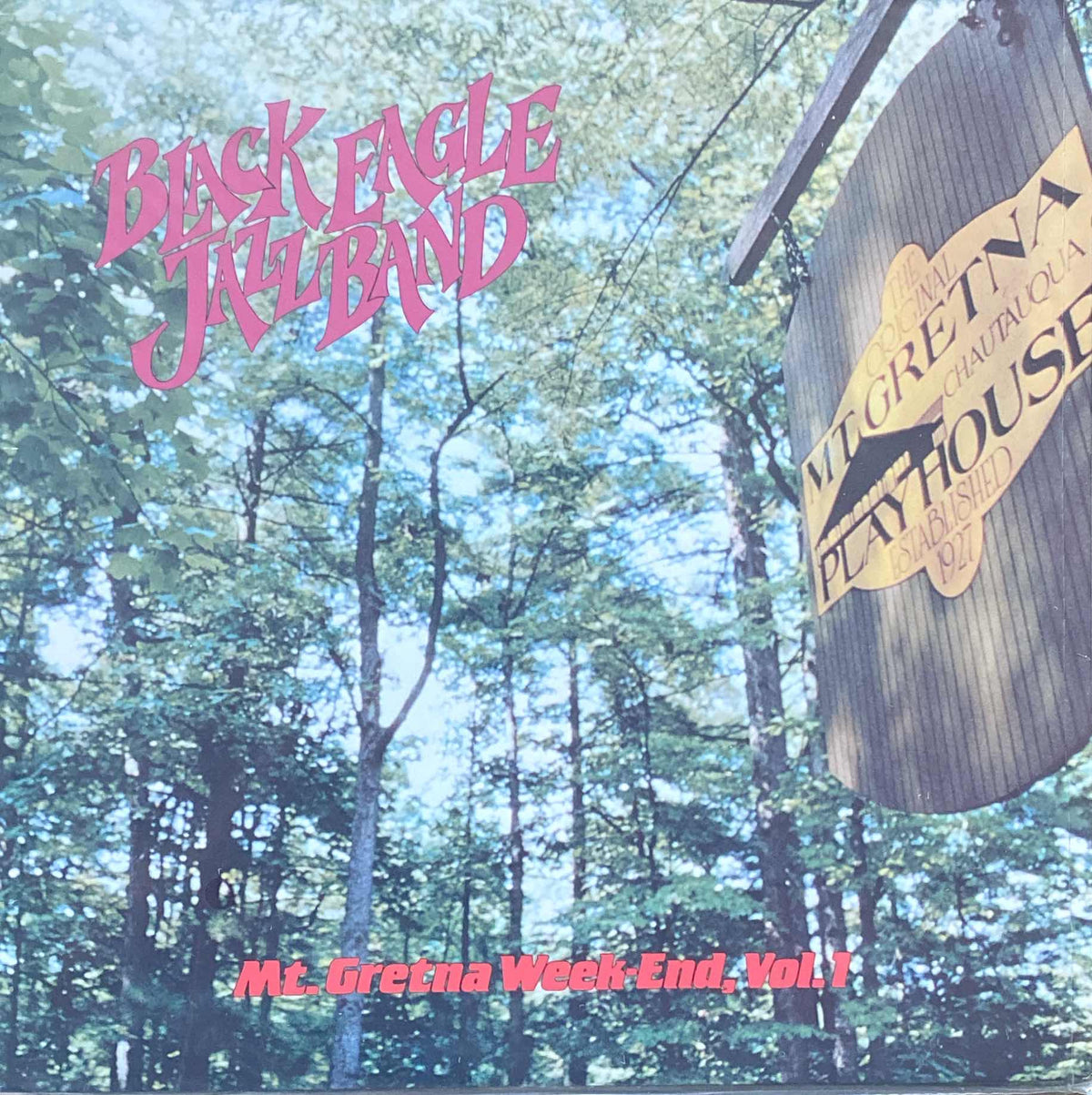 Album cover for "Black Eagle Jazz Band - Mt. Gretna Week-End Vol. 1" featuring a sign hanging from a tree branch with forest background and showcasing the title "New Orleans" by Tandem Coffee Roasters.