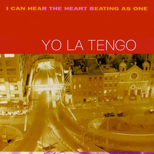 Album cover of "Yo La Tengo - I Can Hear the Heart Beating as One" by Tandem Coffee Roasters, featuring a sepia-toned aerial photo of a city street scene with buildings and cars, and the band's