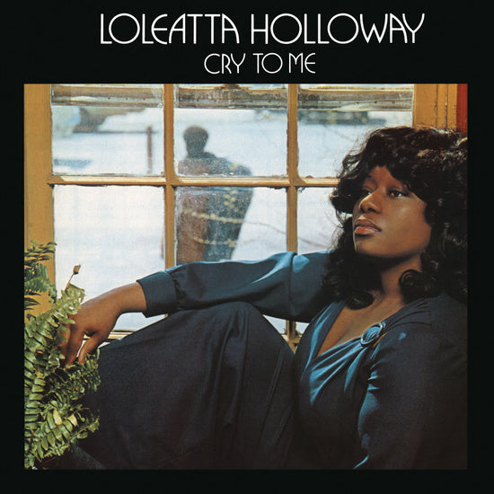 Album cover of "Loleatta Holloway - Cry To Me" by Tandem Coffee Roasters featuring the artist sitting by a window, looking thoughtful, with a plant beside her and a snowy scene visible through the glass.