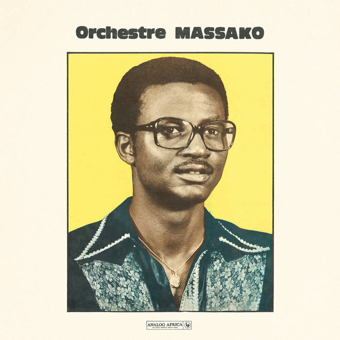 Album cover of "Orchestre Massako" by Tandem Coffee Roasters featuring a portrait of Mack-Joss wearing glasses and a denim jacket, set against a yellow background with the band's name at the top.