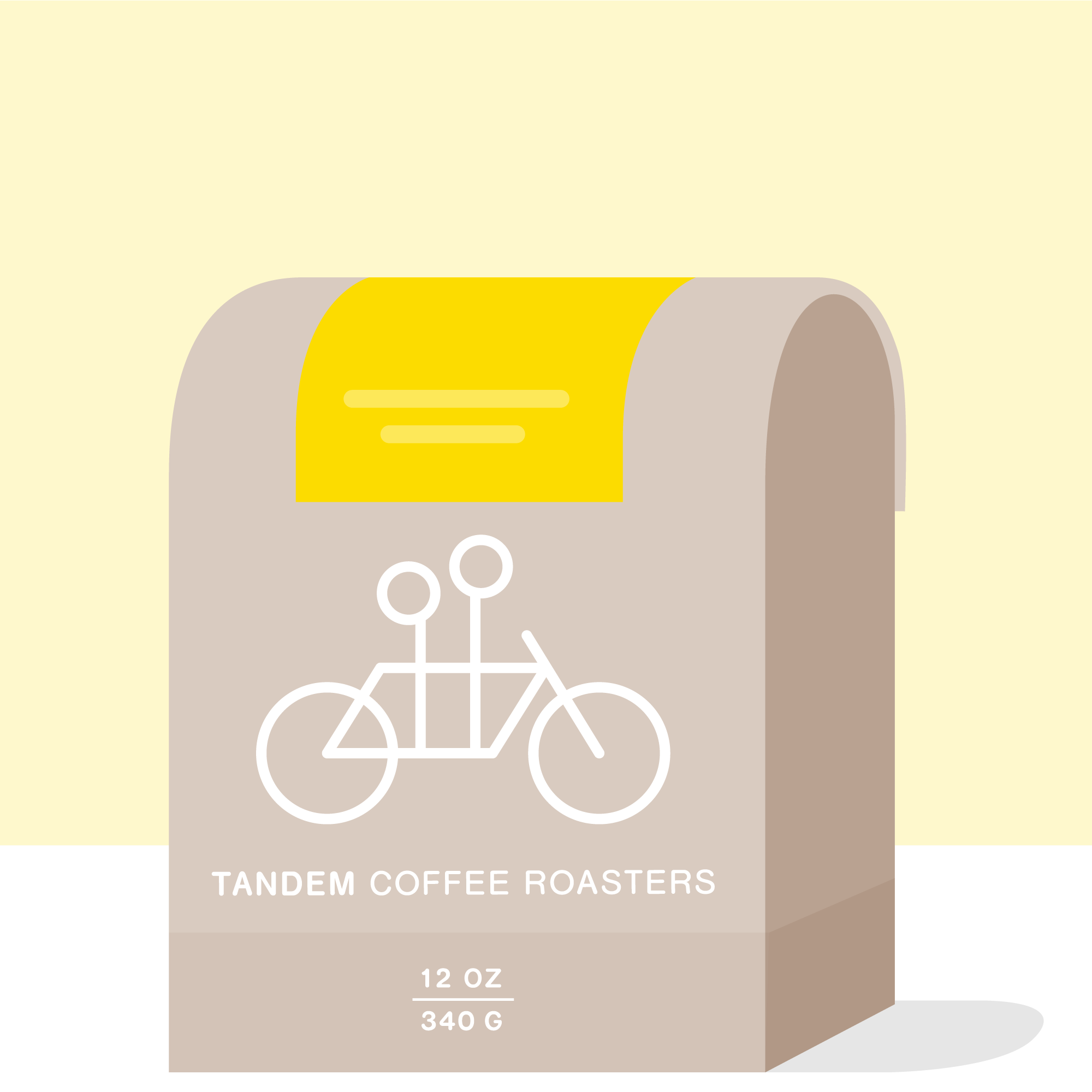 A stylized illustration of a gray Sun Lamp Decaf coffee bag with a tandem bicycle logo, labeled "Tandem Coffee Roasters" and a weight indication of 12 oz or 340 g.