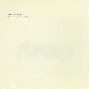 The Built to Spill - There’s Nothing Wrong With Love bag from Tandem Coffee Roasters features small gray text on a light beige background with subtle gray smudges.