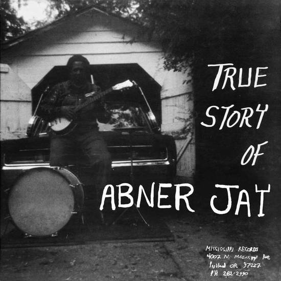 Album cover showing a man seated on the hood of a vintage car, playing a guitar in front of a garage, with the text "True Story of Abner Jay" above him.